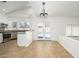 Bright dining area with tiled floors, pendant lighting and direct access to the outdoor pool and patio at 3755 E Broadway Rd # 21, Mesa, AZ 85206