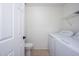 Laundry area with modern washing machine and dryer, shelving and tile floor at 3755 E Broadway Rd # 21, Mesa, AZ 85206