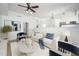Bright open-concept living room with views of the kitchen and stairs at 3755 E Broadway Rd # 21, Mesa, AZ 85206