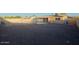 Spacious backyard area with decorative gravel and a chain link fence at 4132 E Sweetwater Ave, Phoenix, AZ 85032
