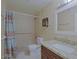 Full bathroom with tiled shower, granite countertop, and framed mirror at 4132 E Sweetwater Ave, Phoenix, AZ 85032