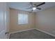 Cozy bedroom featuring a ceiling fan and a bright window at 4132 E Sweetwater Ave, Phoenix, AZ 85032