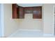 Kitchen area with upper cabinets and tile flooring at 4132 E Sweetwater Ave, Phoenix, AZ 85032