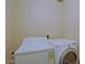 Well lit laundry room featuring a white washer and dryer at 4132 E Sweetwater Ave, Phoenix, AZ 85032