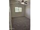 Bedroom with plush carpeting and natural lighting at 4613 W Fawn Dr, Laveen, AZ 85339