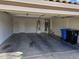 Two car garage with water heater, neutral walls, and concrete floor at 4613 W Fawn Dr, Laveen, AZ 85339