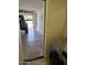 Attached garage with roll-up door, access door, and modern appliances at 4613 W Fawn Dr, Laveen, AZ 85339