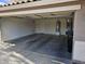 Two car garage with water heater, neutral walls, and concrete floor at 4613 W Fawn Dr, Laveen, AZ 85339
