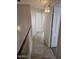 Upstairs hallway featuring tiled floors and neutral paint at 4613 W Fawn Dr, Laveen, AZ 85339
