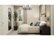 Elegant bedroom showcasing a bed with decorative pillows and ambient lighting at 4752 E Topaz Dr, San Tan Valley, AZ 85140