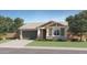 Charming single-story home with a neutral color scheme, a 2-car garage, and tidy landscaping at 4752 E Topaz Dr, San Tan Valley, AZ 85140