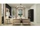 Bright living room with neutral tones, modern furniture, and stylish lighting at 4752 E Topaz Dr, San Tan Valley, AZ 85140