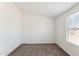 Bedroom featuring neutral walls, carpet floors, and a window with a view at 51288 W Bluejay St, Maricopa, AZ 85139