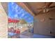 Covered patio featuring a ceiling fan and an outdoor living area at 5342 W Maldonado Rd, Laveen, AZ 85339