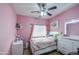 This bedroom features a ceiling fan, and a white dresser at 5342 W Maldonado Rd, Laveen, AZ 85339