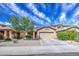 Attractive single-story house with low-maintenance desert landscaping at 5342 W Maldonado Rd, Laveen, AZ 85339
