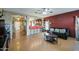 Spacious living area with hardwood floors and comfortable seating at 5342 W Maldonado Rd, Laveen, AZ 85339