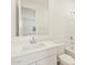 Modern bathroom featuring an all-white vanity, sink, toilet, and shower at 5526 S 246Th Ave, Buckeye, AZ 85326