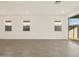 Bright and airy living space featuring recessed lights and multiple windows for natural light at 5526 S 246Th Ave, Buckeye, AZ 85326