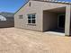 Exterior shot of the backyard, showcasing a covered patio at 5537 S 246Th Ave, Buckeye, AZ 85326