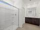 Well-lit bathroom showcases a spacious walk-in shower and double sink vanity at 5537 S 246Th Ave, Buckeye, AZ 85326