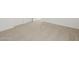 Spacious bedroom with neutral carpet, white walls, and multiple doors at 5537 S 246Th Ave, Buckeye, AZ 85326
