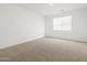 Neutral bedroom with carpet, window, and white walls at 5537 S 246Th Ave, Buckeye, AZ 85326