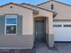 Charming single-story home featuring a two-car garage and professionally landscaped front yard at 5537 S 246Th Ave, Buckeye, AZ 85326