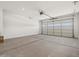 Spacious two-car garage with automatic door, concrete floor, and abundant space at 5537 S 246Th Ave, Buckeye, AZ 85326
