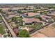 Aerial view showcasing private pool, meticulous landscaping, and desert home in a well-planned community at 5755 S Pearl Dr, Chandler, AZ 85249