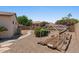 Backyard featuring a small garden area, shrubbery and a covered patio at 5755 S Pearl Dr, Chandler, AZ 85249