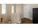 Entryway featuring hardwood flooring and a white entry door and neutral colored walls at 5755 S Pearl Dr, Chandler, AZ 85249