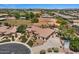 Beautiful single-story home with lush landscaping, manicured lawn and circular driveway at 5755 S Pearl Dr, Chandler, AZ 85249