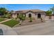 Well maintained lawn with mature trees and professional landscaping in a circular drive at 5755 S Pearl Dr, Chandler, AZ 85249