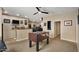 Game room featuring a foosball table, adjoining living room and a view of the rest of the house at 5755 S Pearl Dr, Chandler, AZ 85249