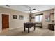 Game room featuring a foosball table, ceiling fan, window for natural light and decorative wall art at 5755 S Pearl Dr, Chandler, AZ 85249