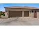 Three car garage with carriage doors at 5755 S Pearl Dr, Chandler, AZ 85249