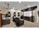 Home theater with a large screen, overhead projector, recliner seating and surround sound speakers at 5755 S Pearl Dr, Chandler, AZ 85249