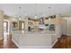 Well-equipped kitchen with stainless steel appliances, granite countertops, and custom cabinetry at 5755 S Pearl Dr, Chandler, AZ 85249