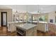 Spacious kitchen with a center island and stainless steel appliances, ideal for entertaining at 5755 S Pearl Dr, Chandler, AZ 85249