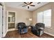 Cozy sitting room with wood floors and comfortable, oversized chairs at 5755 S Pearl Dr, Chandler, AZ 85249