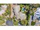 Aerial view of the expansive estate, lush backyard with pool and well manicured landscaping at 6467 E Sierra Vista Dr, Paradise Valley, AZ 85253