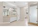 Bright bathroom with a double sink vanity, a stand-up shower, and access to a private toilet at 6467 E Sierra Vista Dr, Paradise Valley, AZ 85253
