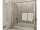 Bathroom features a glass-enclosed shower over a tub with tiled surround at 6467 E Sierra Vista Dr, Paradise Valley, AZ 85253