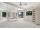 Spacious bedroom with natural light, neutral walls and carpet, built-in shelves and an ensuite at 6467 E Sierra Vista Dr, Paradise Valley, AZ 85253