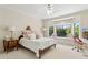 Serene bedroom with a window seat, elegant decor and lots of natural light at 6467 E Sierra Vista Dr, Paradise Valley, AZ 85253