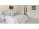 Serene bedroom with a view of the en-suite bathroom, a comfortable bed, and decorative accents at 6467 E Sierra Vista Dr, Paradise Valley, AZ 85253