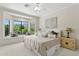 Bright bedroom with a large bay window, mountain views and decorative pillows at 6467 E Sierra Vista Dr, Paradise Valley, AZ 85253