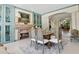 Elegant dining room with a fireplace and seating for six, perfect for entertaining guests at 6467 E Sierra Vista Dr, Paradise Valley, AZ 85253