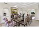 Dining room featuring a large table with seating for eight and decorative wall niches at 6467 E Sierra Vista Dr, Paradise Valley, AZ 85253